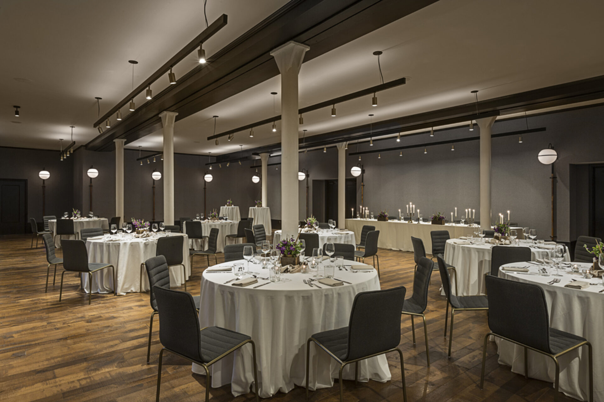 Event venue in Kansas City, MO set up with round tables in white tablecloths